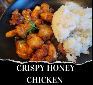 A plate of crispy honey chicken garnished with herbs is served alongside a portion of white rice. The text "Crispy Honey Chicken" is displayed below the food.
