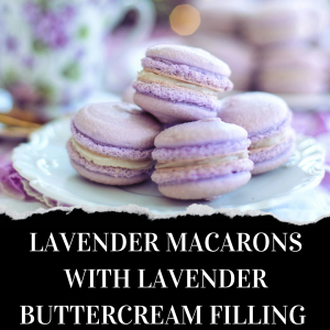 Plate of lavender macarons with lavender buttercream filling, placed on a floral tablecloth.